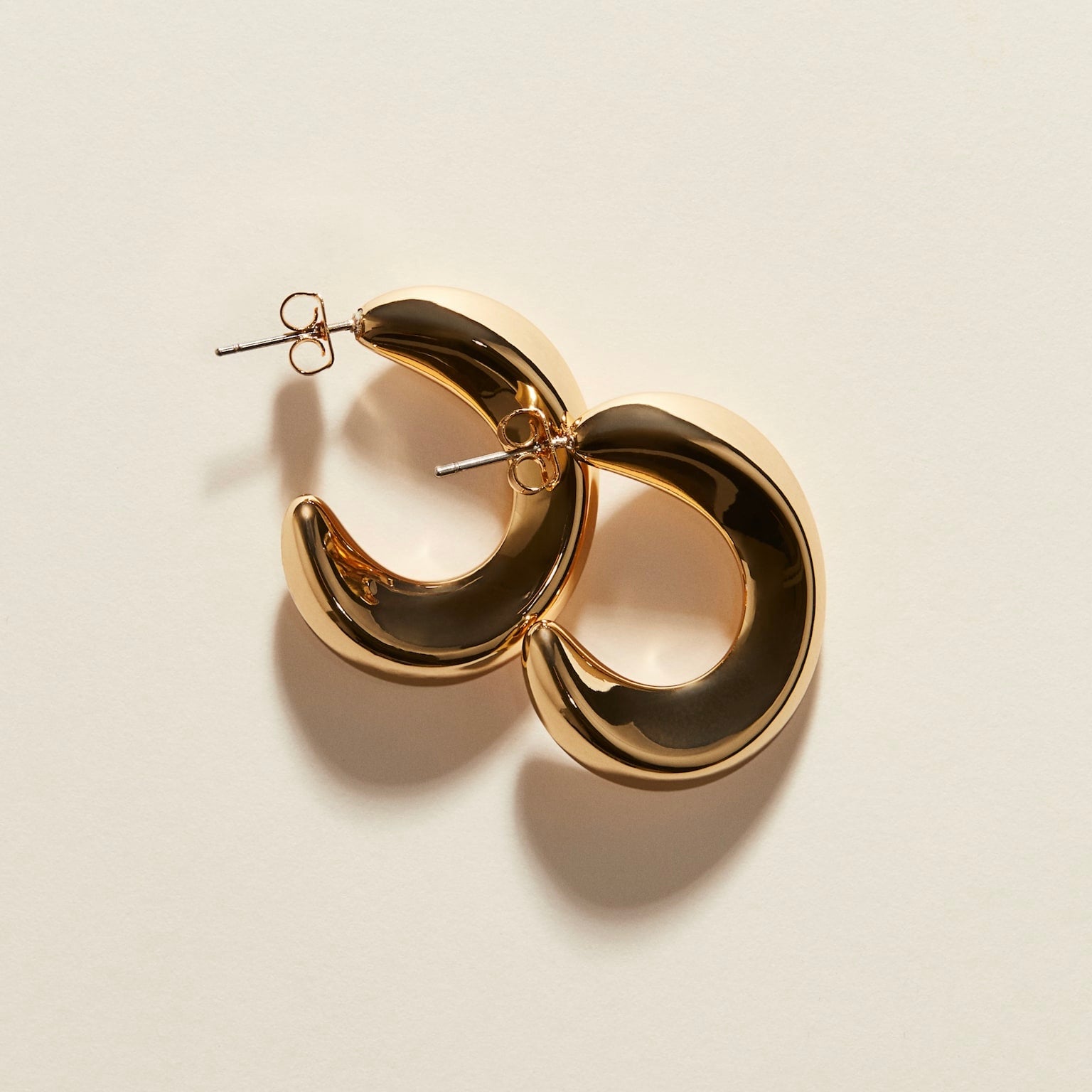 Bold Gold Crescent Hoop Earrings – Sleek &amp; Modern